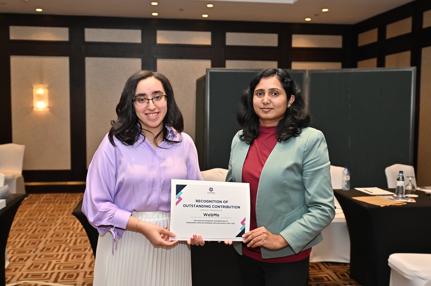 Harsha Sreehari receiving ThinkSmart's Recognition of Outstanding Contribution for WebMe, August 2025